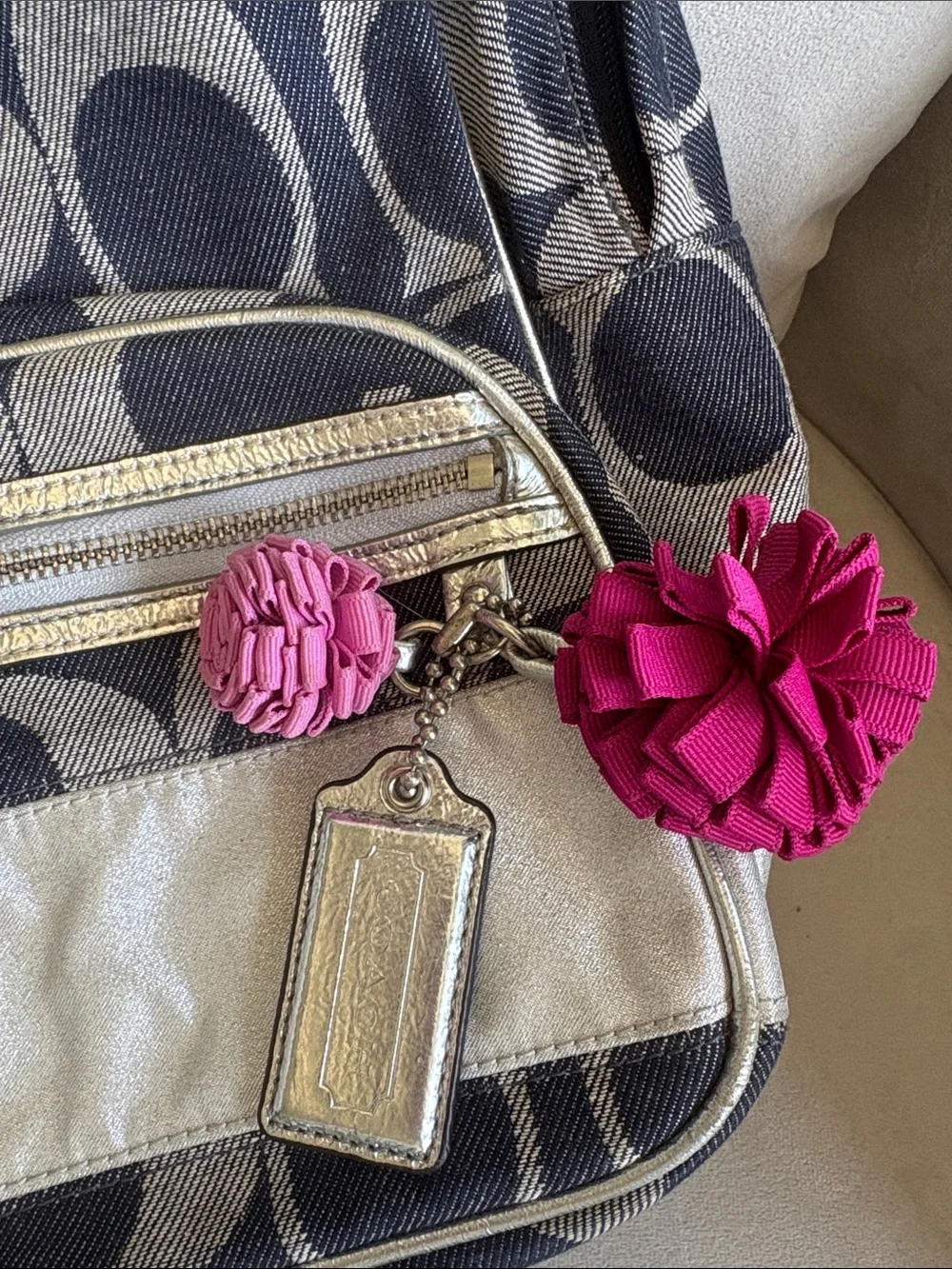 Coach Navy and Cream Signature Canvas Backpack with Pink Pom Charm